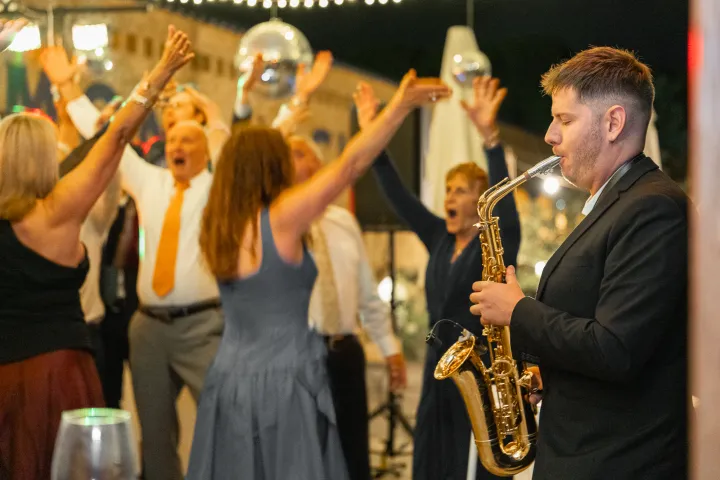 Gustime live saxophone and DJ performance at a wedding or event in Australia — photo 8